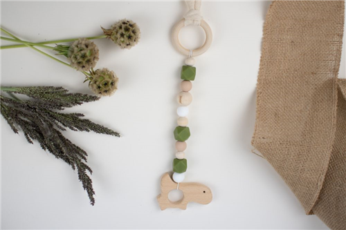 colgante dinosaurio silicon verde con blanco