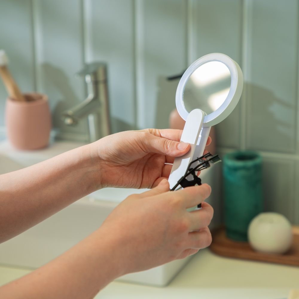 Espejo plegable con luz LED