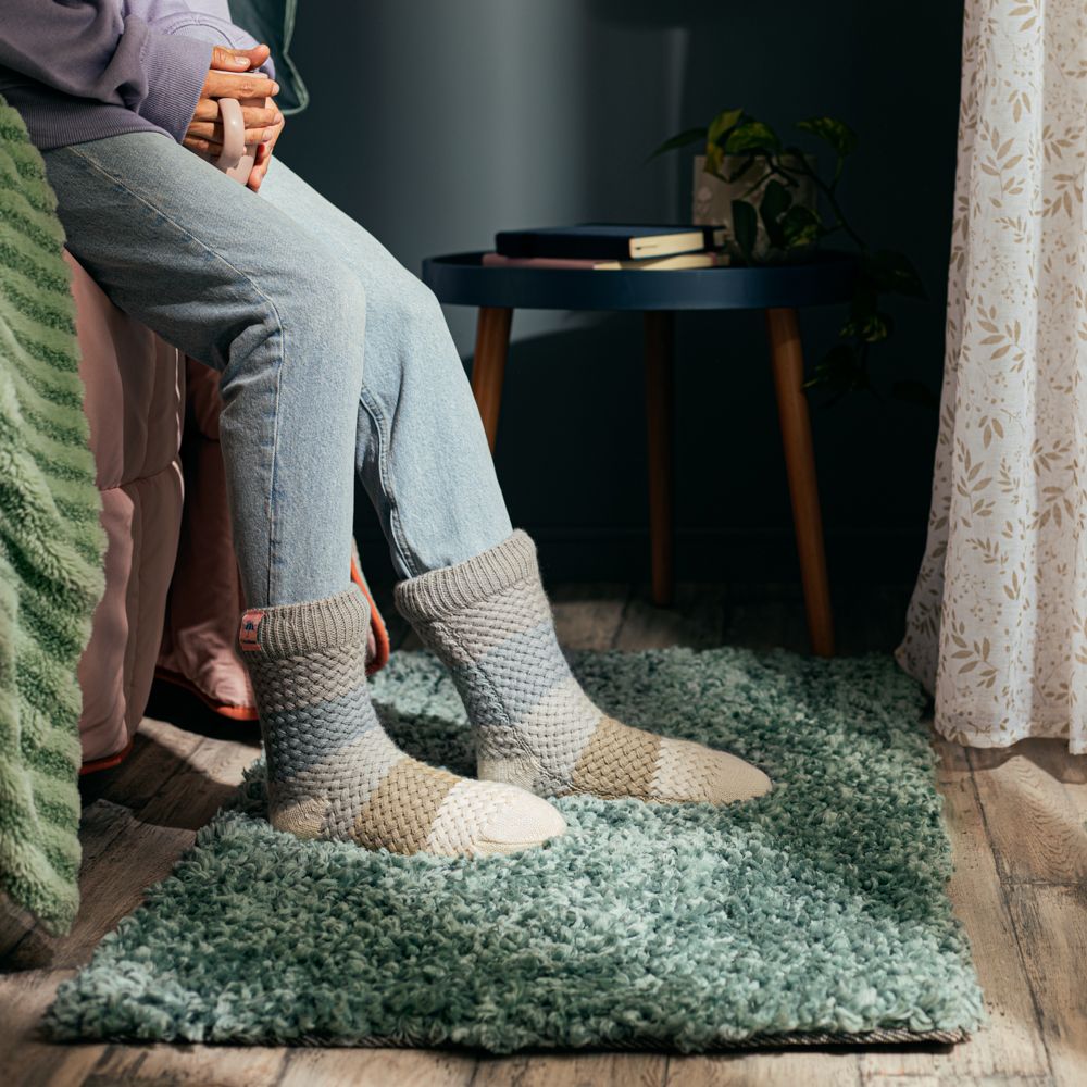 Calceta tejida sherpa con diseño M