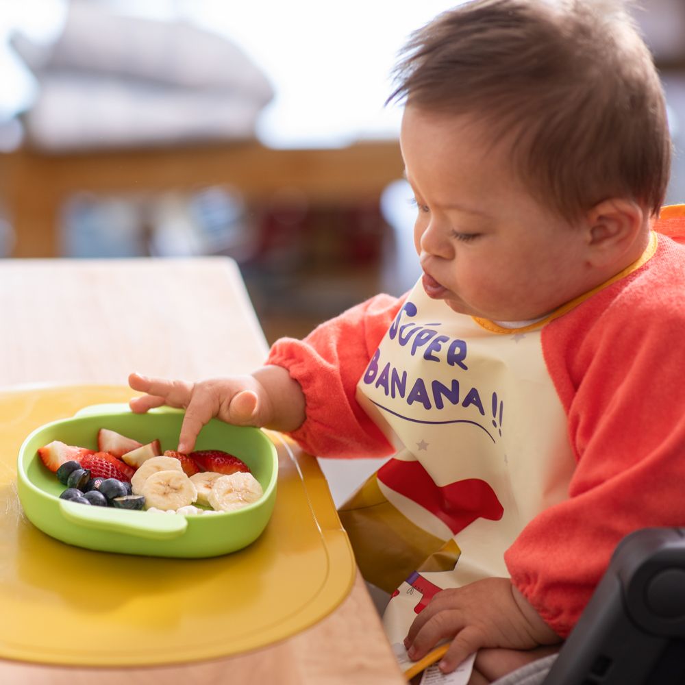 Babero impermeable con mangas