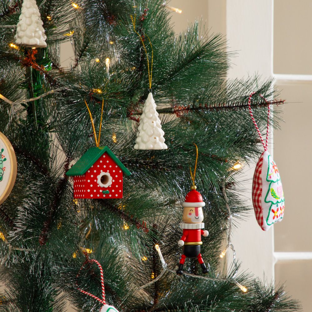 Adorno de navidad de casita