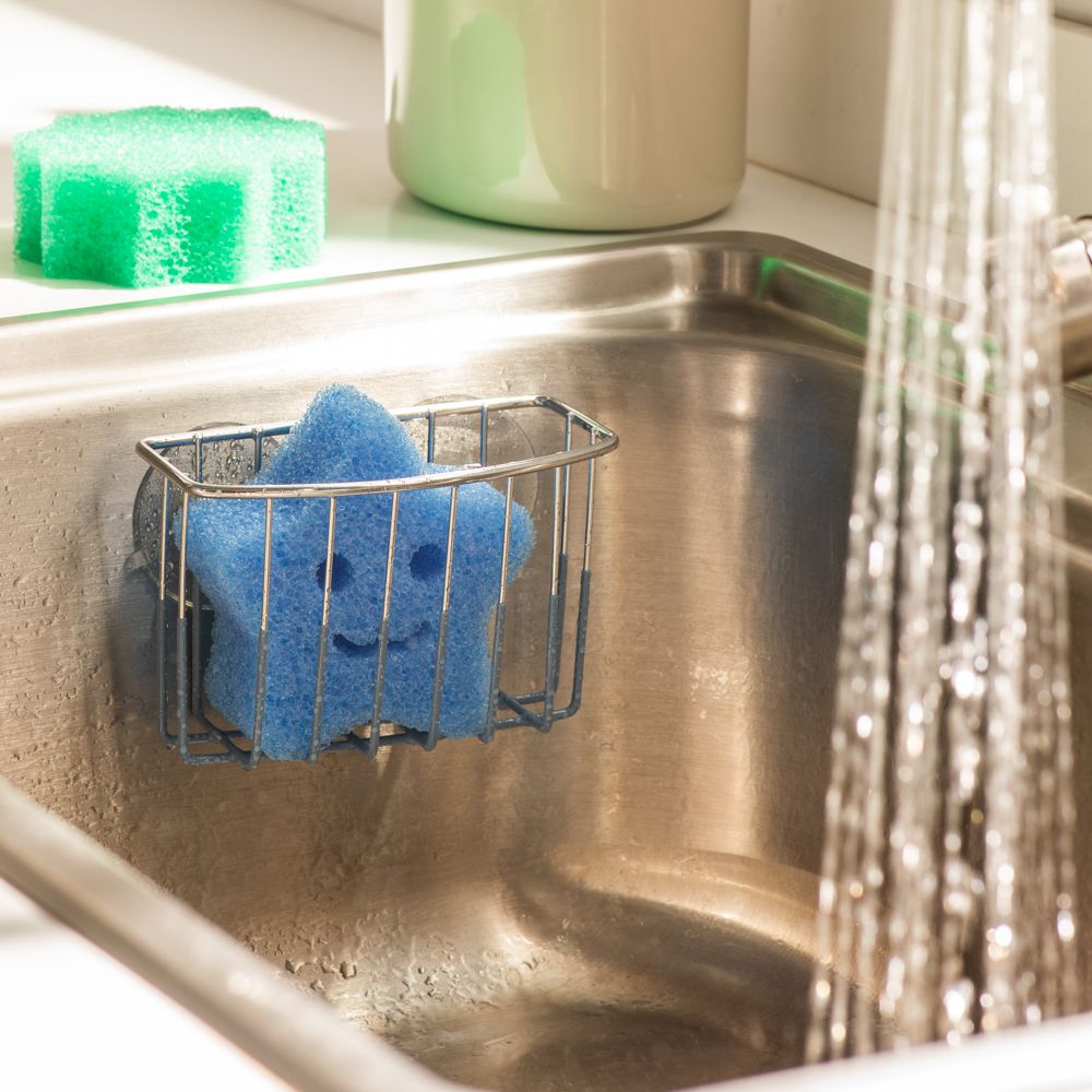 Canasto organizador de metal con succión lavaplatos