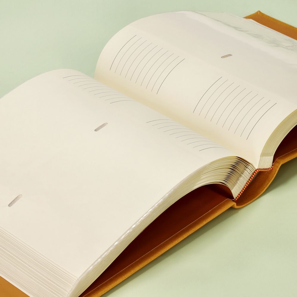 Álbum de fotos tapa tela con bolsillos para 200 fotos 22x5.5x24 cm