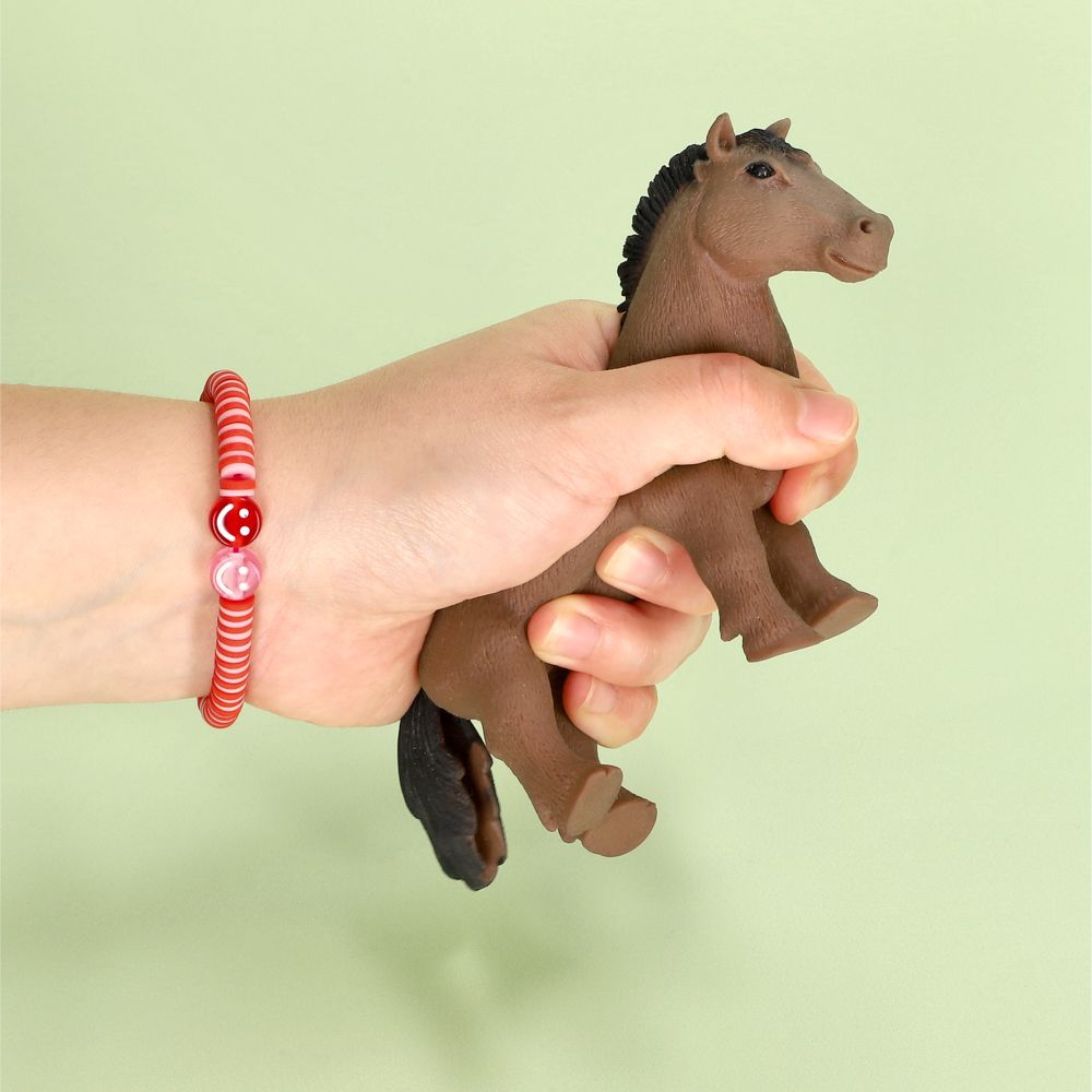 Juguete animal apretable caballo