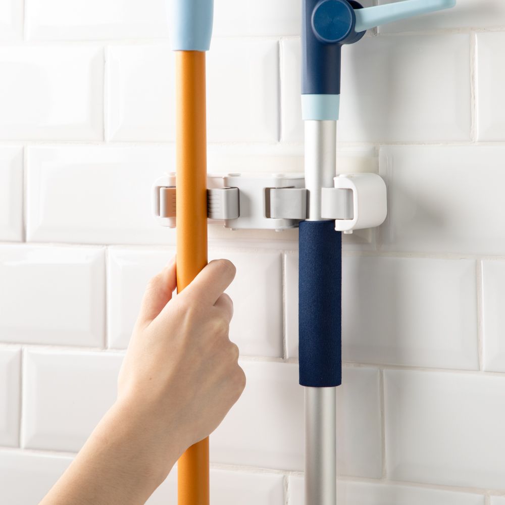 Soporte de pared para escoba multiuso