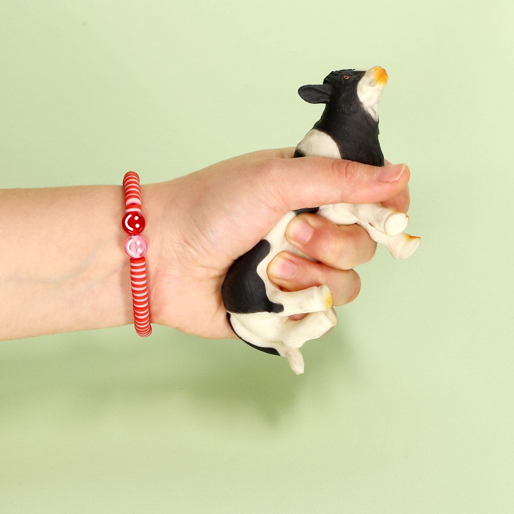 Juguete animal apretable vaca