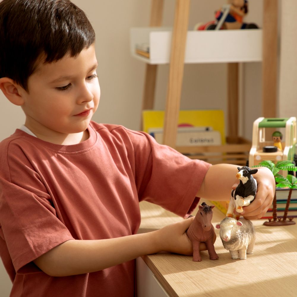 Juguete animal apretable vaca