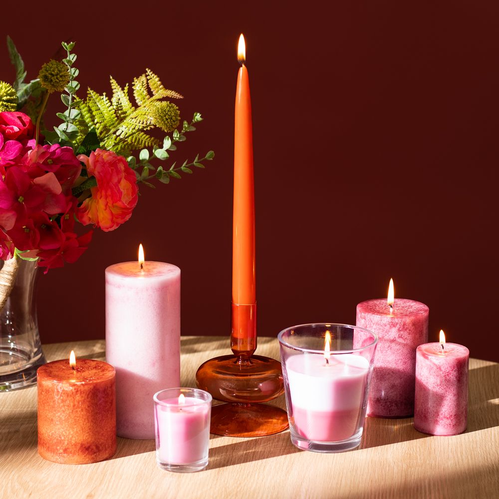 Vela con contenedor de vidrio aroma toronja 9x10 cm